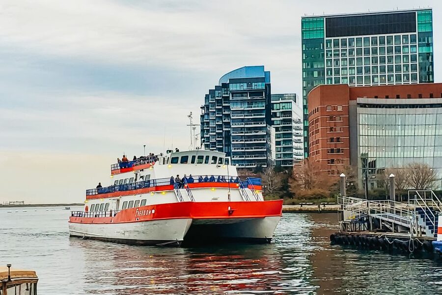 Boston: Boston Harbor Sunset Cruise - Onboard comfort: seating choices, bar details, and staying warm