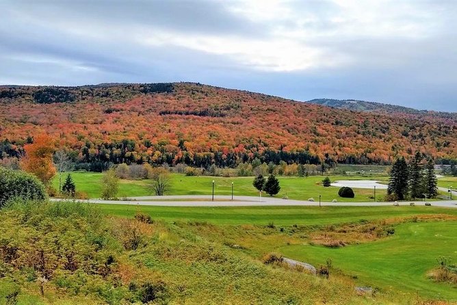 Boston to New Hampshire Fall Foliage White Mountains Day Trip - Omni Mount Washington Resort: the photo time and the Old Man on the Mountain ledges